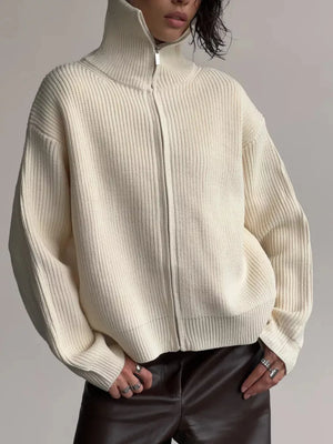 Cream ribbed knit zipper cardigan with high neck and acrylic material.