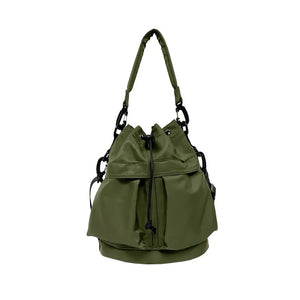 Moss green nylon bucket bag with drawstring closure and chain detail.