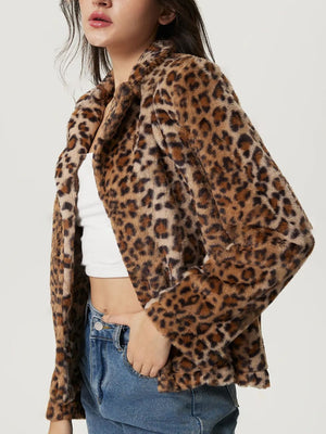 Leopard print faux fur blazer with a buttoned front and lapel collar.