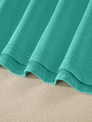 Teal mineral wash cotton tee detail showing hem and stitching