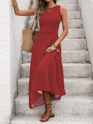 Deep red polka dot maxi dress with a flattering silhouette and sleeveless design.