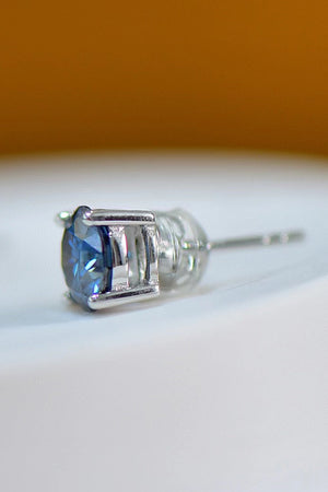 Blue sapphire stud earring in platinum with a classic four-prong setting.