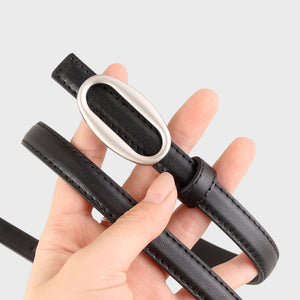 Black cowhide leather skinny belt with oval silver buckle