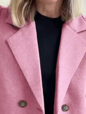 Pink double-breasted wool blend blazer with button detail.