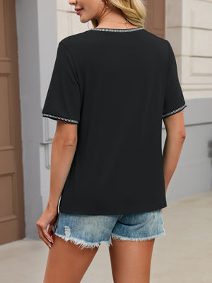 Black short sleeve t-shirt with contrast trim neckline and cuffs.