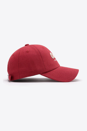 Deep Red baseball cap with embroidered detail and adjustable strap