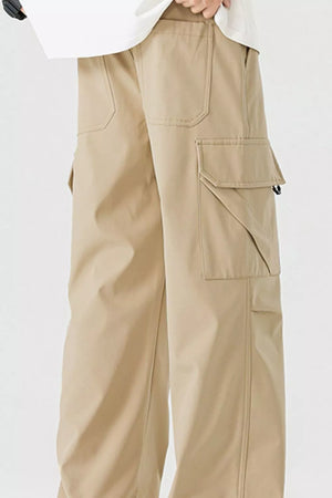 Men's tan cargo pants with multiple pockets and a relaxed fit.