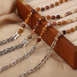 Silver asymmetrical chain necklace with mixed stone beads and gold accents