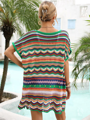 Chevron knit beach cover-up with multicolor stripes and green trim.