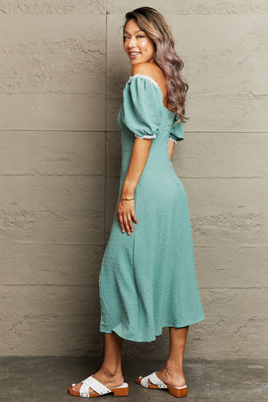 Teal dotted swiss off-shoulder midi dress with lace trim and puff sleeves