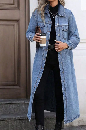 Longline blue denim jacket with pockets, button front and collared neckline.