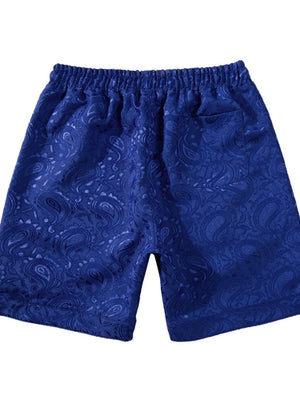 Royal blue jacquard paisley shorts with elastic waistband and back pocket.