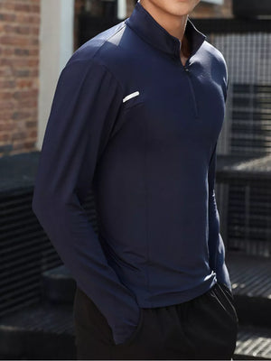 Men's royal blue quarter-zip active t-shirt with a chest accent.