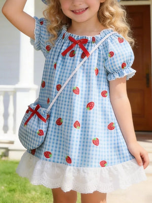 Baby dress set with blue gingham, strawberry print, puff sleeves, lace trim, and matching purse.