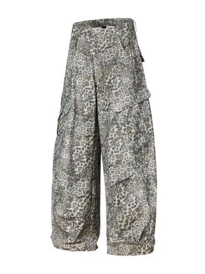 Leopard print cargo pants with utility pockets and a button fly.