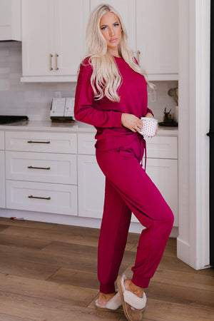 Plush lounge set in Deep Rose, featuring relaxed fit joggers with a drawstring waist and cuffed ankles.