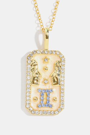 14K gold-plated Gemini zodiac pendant necklace with crystal accents and enamel.