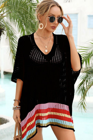 Black crochet cover-up with rainbow hemline, V-neck, and short sleeves.