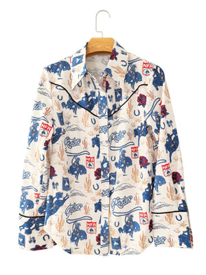 Maternity long sleeve shirt in Milky White with rodeo print, button-down front, and black piping.