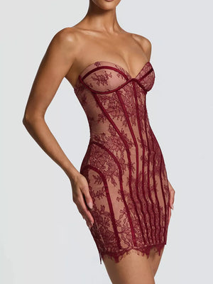 Burgundy lace overlay strapless mini dress with corset detailing and a bodycon fit.
