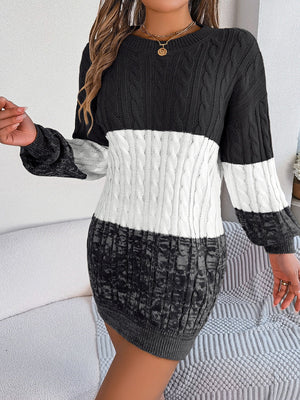 Colorblock cable knit mini dress in black, white, and grey acrylic.