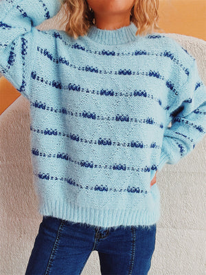 Pastel blue crew neck sweater with textured navy stripes and fuzzy acrylic knit.