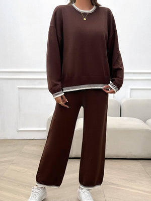 Brown knit lounge set with white ribbed trim on crewneck, cuffs, and hem.