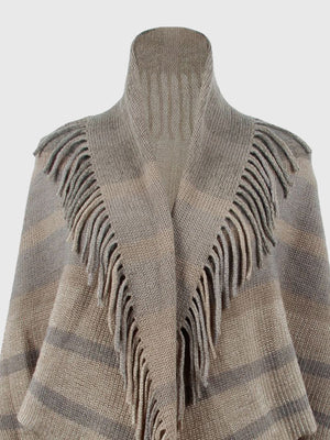 Textured knit capelet in Khaki with fringe detail and striped pattern.