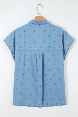 Light blue denim shirt with allover dark star print, short sleeves, and button-down style.