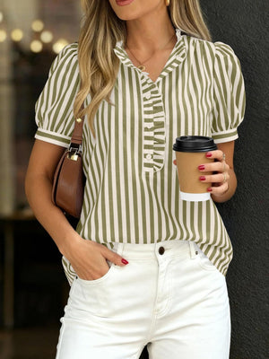 Ruffled puff sleeve blouse in light green and white stripes with button-down front and ruffled collar.