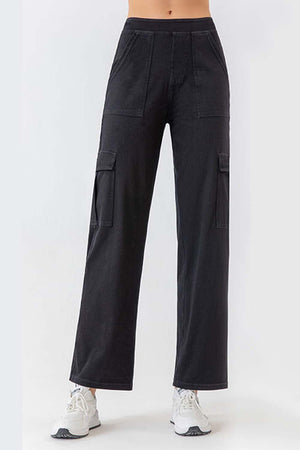 Black denim cargo pants with multiple pockets and a relaxed fit.