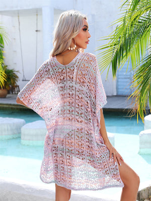 Lace-knit kaftan cover-up in pastel pink, green, and lavender with side tie detail.