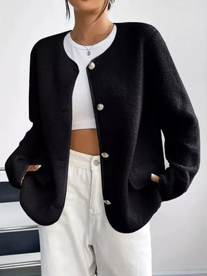 Black textured button-up fleece jacket with round neckline and ornate buttons.