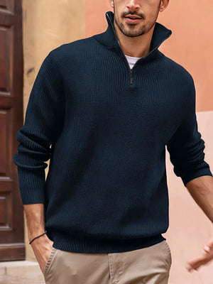 Navy ribbed quarter-zip pullover sweater with a stand-up collar and zipper detail.