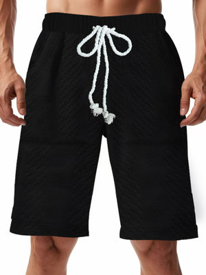 Black quilted texture drawstring men's chino shorts with diamond pattern.