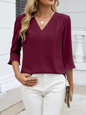Wine Red V-neck blouse with 3/4 sleeves and lace trim details.