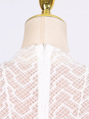 White lace maxi dress with mock neck and back zipper detail.