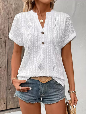 White diamond pattern short-sleeve t-shirt with button detail and v-neck