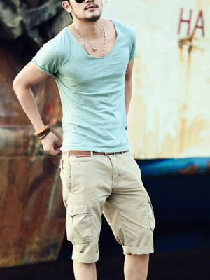 Men's light blue cotton relaxed scoop neck tee with short sleeves.