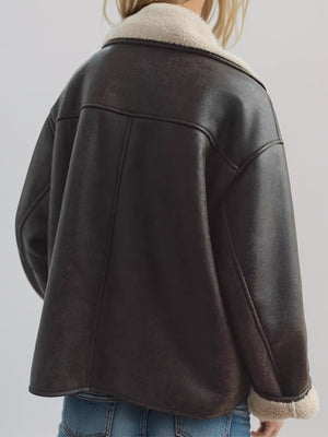 Oversized aviator jacket in chocolate brown with shearling trim and collar detail.