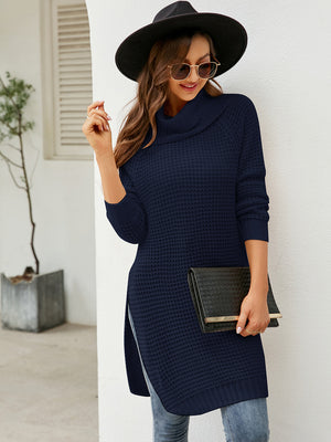 Dark blue waffle knit tunic with cowl neckline and side slits, acrylic.