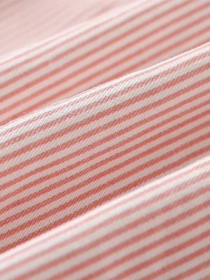 Pink and white striped cotton fabric detail