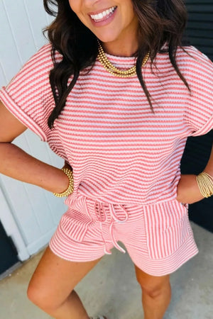 Textured knit two-piece set with pink and white stripes, featuring a drawstring waist on the shorts.