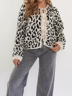 Cardigan with leopard print, tie-front closure, and crew neck.