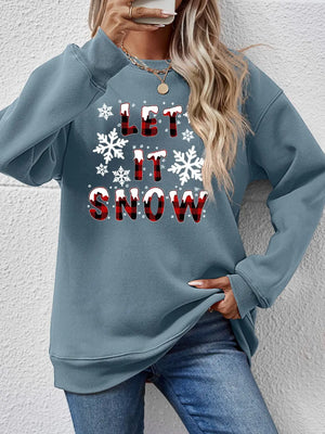 Misty Blue crewneck sweatshirt with "Let It Snow" graphic and snowflakes.