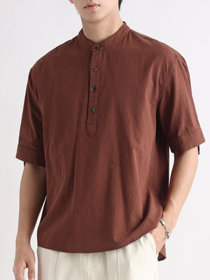 Brown band collar button-down short sleeve blouse with a casual fit.