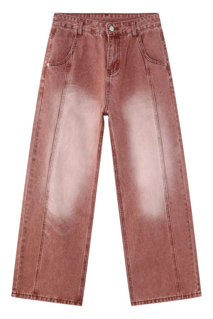 Relaxed fit coral denim jeans with a faded wash and front seam detail.