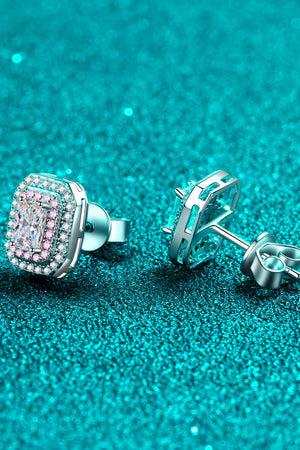 Radiant Emerald-Cut Halo Studs in silver with a central diamond and pink accent stones.
