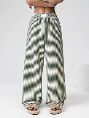 Navy and white striped high-waisted wide-leg pants with a drawstring waist.