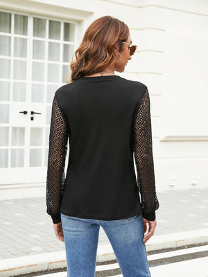 Black waffle knit top with lattice detail long sleeves